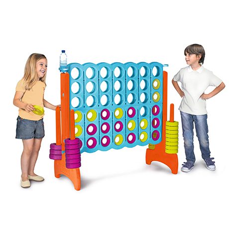 2 children playing a large game of connect 4