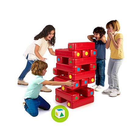 4 children playing with large jenga-like blocks