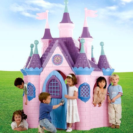 Children playing in a princess playhouse